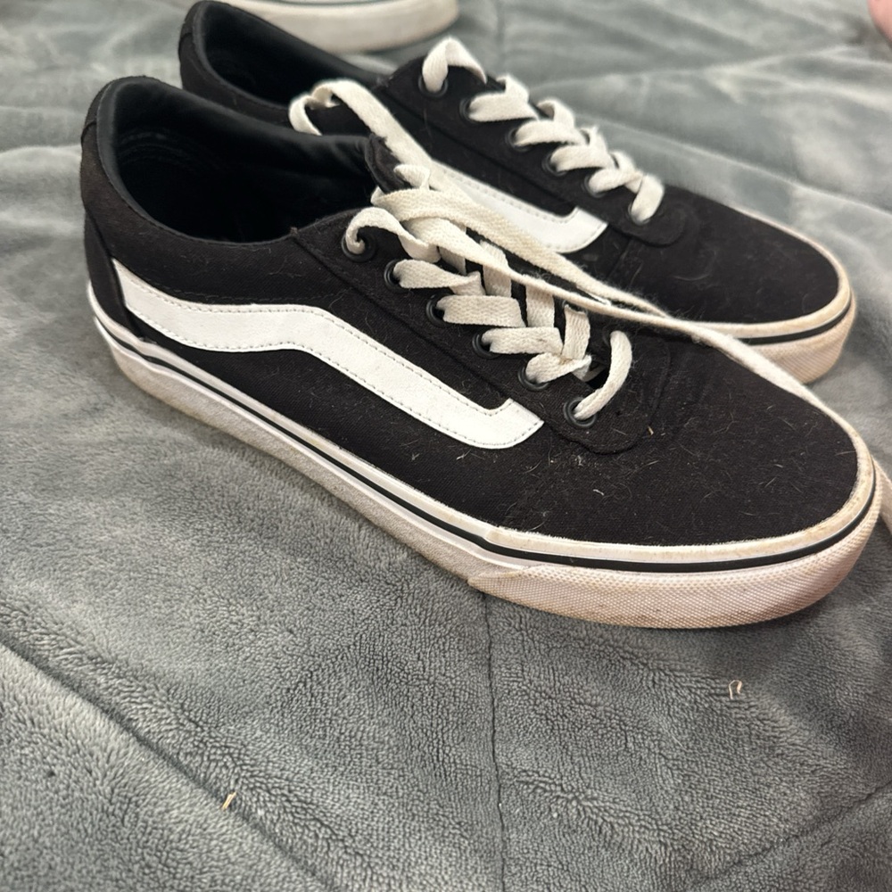 Vans women’s Classic Black and White Sneakers